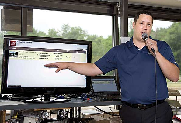 Brian Mofford Drivewyze vicepresident of technology explains the PreClear bypass system during a driveby demonstration June 17th at a Maryland weigh station and inspection site