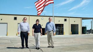 Robert Heistand, Miranda McMas, and Karl Kronquist run Southcoast Container Services in Jacksonville FL. Behind them is the two-bay foodgrade wash rack they opened late last year. The facility also provides container storage and has the potential to add chemical tank cleaning and rail transload services.