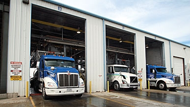 Kenan Advantage Grouprsquos Specialty Products Group wasted no time in beginning the process of absorbing the Enterprise Transport chemical hauling operations that were acquired at the end of January This photo was shot at the former Enterprise terminal and wash rack in Freeport TX The acquisition brought the Specialty Products Group 21 terminals 13 of them with maintenance shops and wash racks