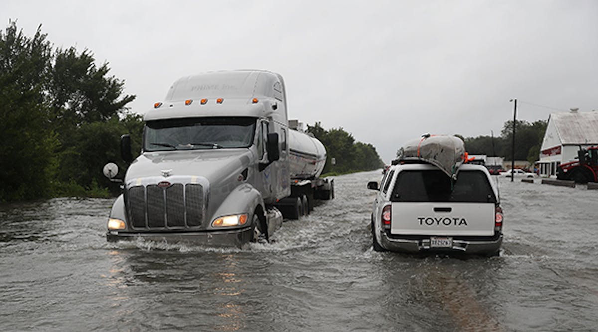 tank-truck-hurricane-flooding-joe-raedle-getty-841011184.jpg