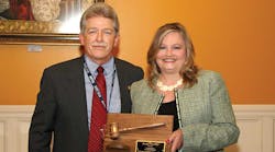 Ray Riley, Miller Transporters Inc and incoming Safety &amp; Security Council chairman, presented a plaque to Becky Perlaky, Kenan Advantage Group Inc, in appreciation of her service as NTTC Safety &amp; Security Council chairman for the past year.