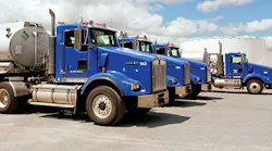 Lineup of tank trucks on lot