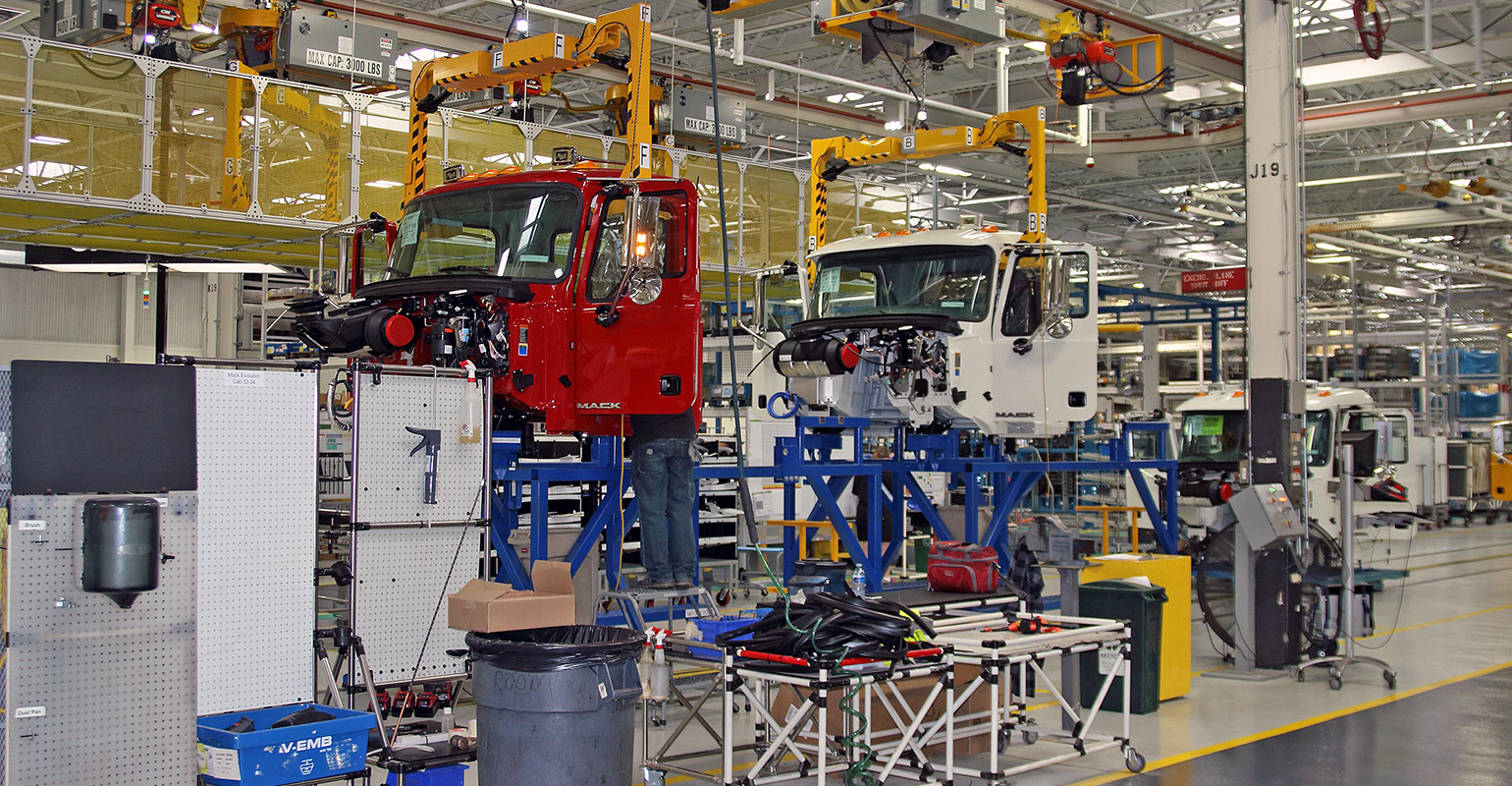 Mack trucks on the assembly line
