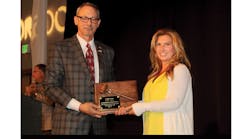 Dave Edmondson, J&amp;M Tank Lines and incoming Tank Truck Safety &amp; Security Council chairman, presented a plaque to Candi Coate, K-Limited Carrier Ltd, in appreciation for her service as Tank Truck Safety &amp; Security Council chairwoman for the past year.
