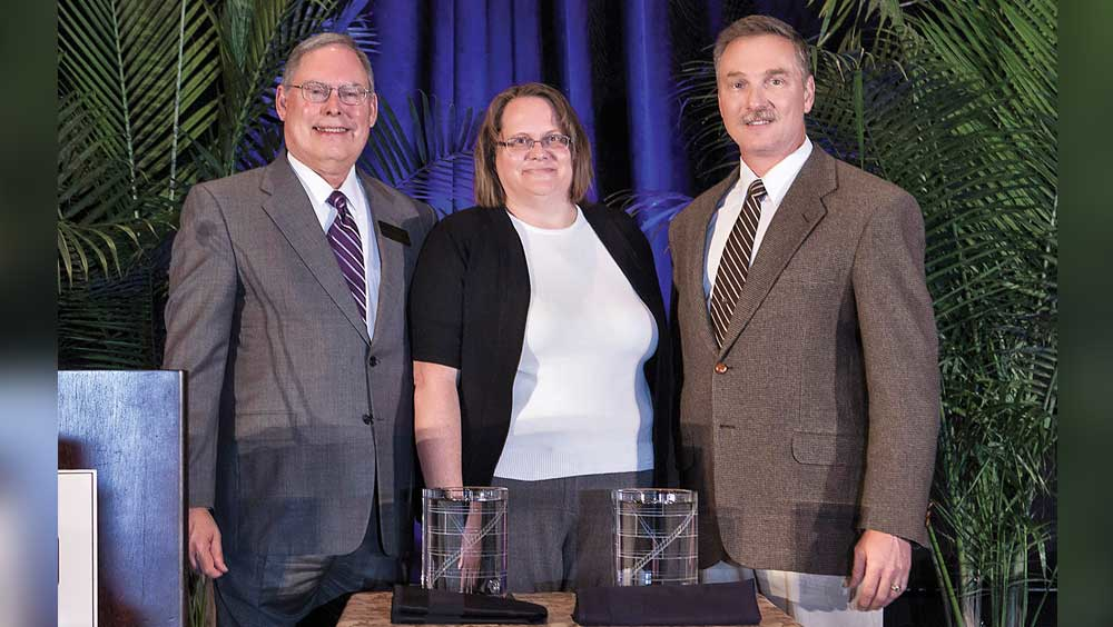 David Doane ILTA president presented the large terminal 2013 Platinum Safety Award to Angela Brown and Tim Aydt Marathon Petroleum Co LLC
