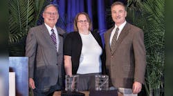 David Doane, ILTA president, presented the large terminal 2013 Platinum Safety Award to Angela Brown and Tim Aydt, Marathon Petroleum Co LLC.