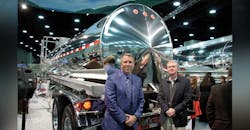 Randall Swift president of Heil Trailer International and Zack Coley vicepresident of sales and marketing stood with the 5000 gallon stainless steel DOT407 trailer displayed a MATS Randall Swift president of Heil Trailer International and Zack Coley vicepresident of sales and marketing stood with the 5000 gallon stainless steel DOT407 trailer displayed a MATS