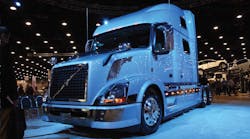 Blue stage lighting gave this Volvo VN a striking appearance during the truck builder&rsquo;s press conference at MATS. Powertrain enhancements and advanced aerodynamics (such as the sun visor redesign) are boosting VN fuel efficiency by 8%.