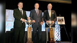 Two tank truck carriers received Outstanding Performance Trophies for tank truck safety in 2014. Randall Swift [center], Heil Trailer International, stands with Bob Wynne [left], Wynne Transport Service Inc, (winner in the under 15-million mile category) and John McNairy [right], Tidewater Transit Co Inc, (winner in the over 15-million mile class).