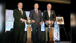 Two tank truck carriers received Outstanding Performance Trophies for tank truck safety in 2014 Randall Swift center Heil Trailer International stands with Bob Wynne left Wynne Transport Service Inc winner in the under 15million mile category and John McNairy right Tidewater Transit Co Inc winner in the over 15million mile class Two tank truck carriers received Outstanding Performance Trophies for tank truck safety in 2014 Randall Swift center Heil Trailer International stands with Bob Wynne left Wynne Transport Service Inc winner in the under 15million mile category and John McNairy right Tidewater Transit Co Inc winner in the over 15million mile class