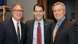 Following his keynote speech Wisconsin Governor Scott Walker center was joined by Dan Furth NTTC and Hans Schaupp LCL Bulk Transport Inc Following his keynote speech Wisconsin Governor Scott Walker center was joined by Dan Furth NTTC and Hans Schaupp LCL Bulk Transport Inc
