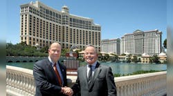 Jim Shaeffer, NTTC immediate past chairman, and Dean Kaplan, NTTC chairman, stand in front of the Bellagio with the traveling trophy that is part of the newly launched NTTC Professional Tank Truck Driver of the Year program.