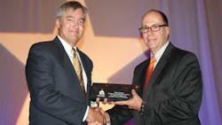 James Shaeffer right McKenzie Tank Lines Inc and newly elected NTTC chairman presents a marble plaque to Hans Schaupp LCL Bulk Transport Inc in appreciation of Schaupprsquos service as the 20122013 NTTC chairman James Shaeffer right McKenzie Tank Lines Inc and newly elected NTTC chairman presents a marble plaque to Hans Schaupp LCL Bulk Transport Inc in appreciation of Schaupprsquos service as the 20122013 NTTC chairman