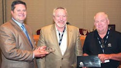 Greg Hodgen left Groendyke Transport and newly elected NTTC chairman and Dick Lehr right Great West Casualty present a crystal tank truck on a marble base to Steve Rush Carbon Express Inc in appreciation for Rushrsquos service as the 20102011 NTTC chairman Greg Hodgen left Groendyke Transport and newly elected NTTC chairman and Dick Lehr right Great West Casualty present a crystal tank truck on a marble base to Steve Rush Carbon Express Inc in appreciation for Rushrsquos service as the 20102011 NTTC chairman