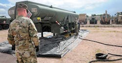 Spc Jonathan Richards and Pvt Annabelle Mowery, Headquarters Service Company, 960th Brigade Service Battalion, Wyoming Army National Guard, coordinate refueling operations with the unit&rsquo;s 5,000-gallon fuel transport during annual training on Camp Guernsey, June 16, 2019. The 960th supported the South Dakota Army National Guard during their visit, as part of the Operation Golden Coyote training exercise.