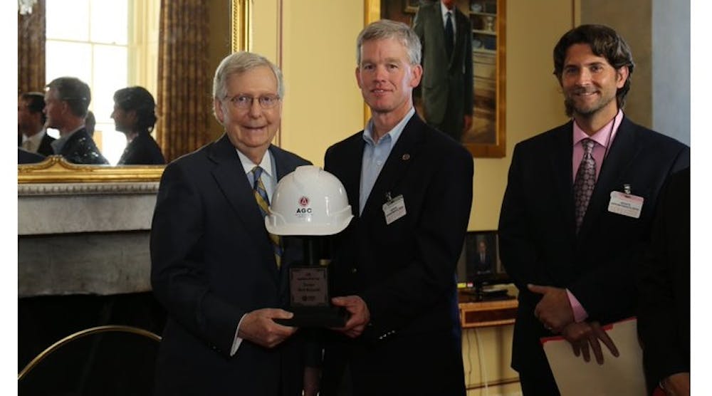 The AGC recently selected Senate Majority Leader Mitch McConnell, left, as its first Legislator of the Year for his support of the construction industry.