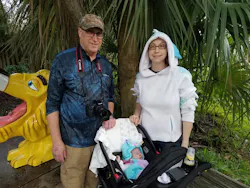 Former Bulk Transporter editor Charles Wilson, left, with daughter Erin and granddaughter Astrid at the zoo. Former Bulk Transporter editor Charles Wilson, left, with daughter Erin and granddaughter Astrid at the zoo.