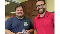 Tommy Wyffels, left, receives his custom-designed 1 million safe miles ring from Christopher Taggart, Atlantic Bulk's safety director. Tommy Wyffels, left, receives his custom-designed 1 million safe miles ring from Christopher Taggart, Atlantic Bulk's safety director.