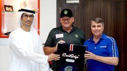 Bader Al Mansoori, at left, Atom Alloys' vice president for government and institutions, and John Fillmon, at right, executive vice president of Atom Alloys, present Terry Johnson, the senior fire service advisor for Dubai Civil Defense, with Atom products. Bader Al Mansoori, at left, Atom Alloys' vice president for government and institutions, and John Fillmon, at right, executive vice president of Atom Alloys, present Terry Johnson, the senior fire service advisor for Dubai Civil Defense, with Atom products.