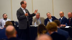 Sen. Mike Braun (R-Ind.) addresses tank truck industry leaders, including NTTC president Ryan Streblow and outgoing chairman Kevin Jackson, at left, during the Advocacy Committee Meeting in Indianapolis, Ind.