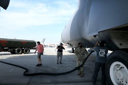Airman First Class Deshawn Carino, 78th Logistics Readiness Squadron Fuels Management Flight Distribution Element distribution operator, and a team of C-5 aircraft functional test mechanics prepare a C-5 Galaxy for defueling operations at Robins Air Force Base in Georgia. One defuel truck takes about an hour to remove fuel from an aircraft and return the fuel to bulk storage. Airman First Class Deshawn Carino, 78th Logistics Readiness Squadron Fuels Management Flight Distribution Element distribution operator, and a team of C-5 aircraft functional test mechanics prepare a C-5 Galaxy for defueling operations at Robins Air Force Base in Georgia. One defuel truck takes about an hour to remove fuel from an aircraft and return the fuel to bulk storage.