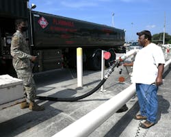 Airman First Class Deshawn Carino, 78th Logistics Readiness Squadron Fuels Management Flight Distribution Element distribution operator, has Sheldon Brown, Bulk Fuel Storage fuel specialist, open the valve to allow fuel to flow out of the tank and into bulk fuel storage tanks at Robins Air Force. It can take around one hour for a single fuel truck operator to do a round trip from an aircraft to bulk fuel storage during defuel operations. Airman First Class Deshawn Carino, 78th Logistics Readiness Squadron Fuels Management Flight Distribution Element distribution operator, has Sheldon Brown, Bulk Fuel Storage fuel specialist, open the valve to allow fuel to flow out of the tank and into bulk fuel storage tanks at Robins Air Force. It can take around one hour for a single fuel truck operator to do a round trip from an aircraft to bulk fuel storage during defuel operations.