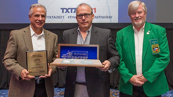 GulfMark Energy recently was named the Grand Champion of the TXTA Truck Safety Contest. Pictured from left to right are GulfMark representatives Don Baldridge, Jeffrey Hackett, and Dennis Bonner.