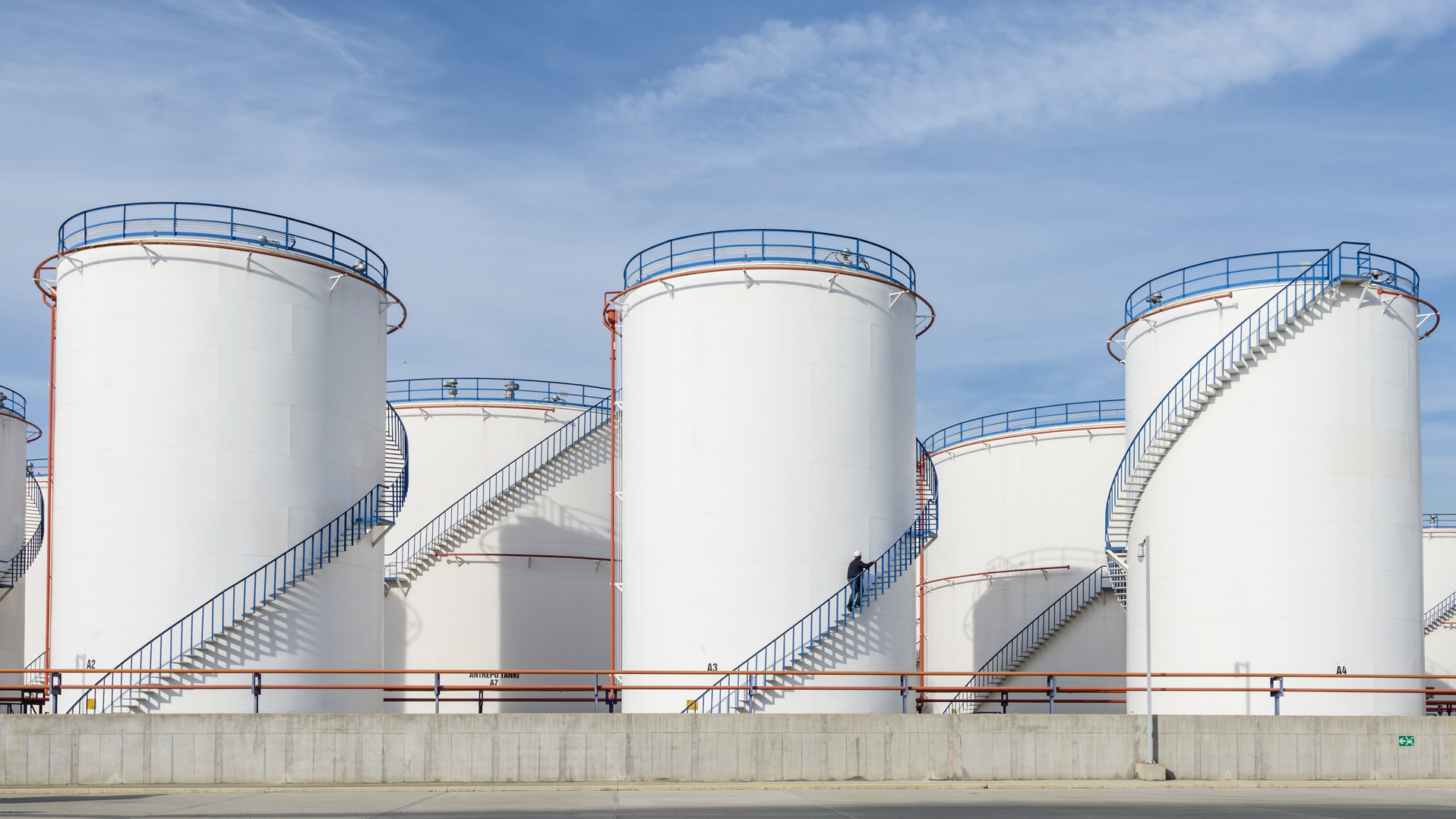 Solvay Large White Industrial Tanks For Petrol And Oil