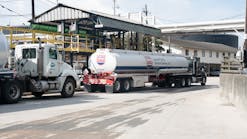 Colonial Fuel &amp; Lubricant Services tank trucks load ship fuel for a vessel in Jacksonville, Fla. CFLS supplies gasoline and diesel, in addition to diesel exhaust fluid and lubricants.