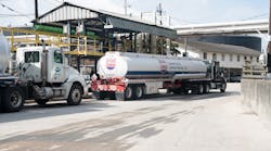 Colonial Fuel &amp; Lubricant Services tank trucks load ship fuel for a vessel in Jacksonville, Fla. CFLS supplies gasoline and diesel, in addition to diesel exhaust fluid and lubricants.
