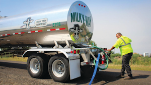 Milky Way driver Mike Szabo delivers water.
