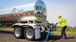 Milky Way driver Mike Szabo delivers water.