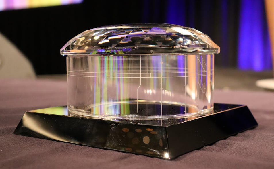Since most winners were not invited on stage, a blank award was provided for use in post-presentation photographs.