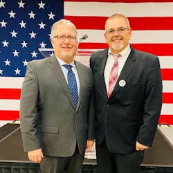 Grammer Logistics VP of legislative affairs John Whittington, at left, stands with Grammer driver James Ellis after Ellis was named one of ATA's 2022-23 Road Team Captains. Grammer Logistics VP of legislative affairs John Whittington, at left, stands with Grammer driver James Ellis after Ellis was named one of ATA's 2022-23 Road Team Captains.