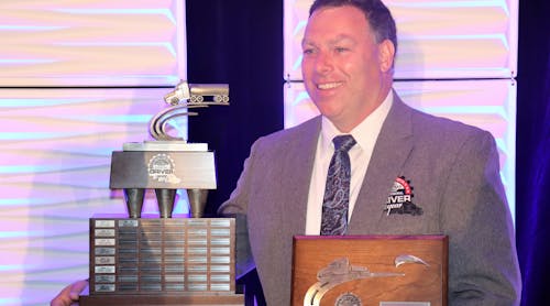 Highway Transport driver Thomas Frain poses with the William A. Usher Sr. Trophy after being named NTTC&apos;s 2021-22 Professional Tank Truck Driver of the Year on Monday, April 25, at the 2022 Annual Conference in San Diego, Calif.
