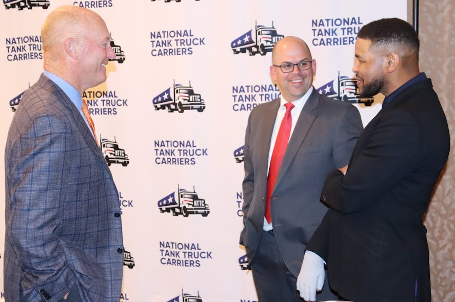Recent past chairman Rob Sandlin, at left, and NTTC president and CEO Ryan Streblow, center, visit with motivational speaker Inky Johnson after his keynote address at NTTC&apos;s 2022 Annual Conference in San Diego, Calif.
