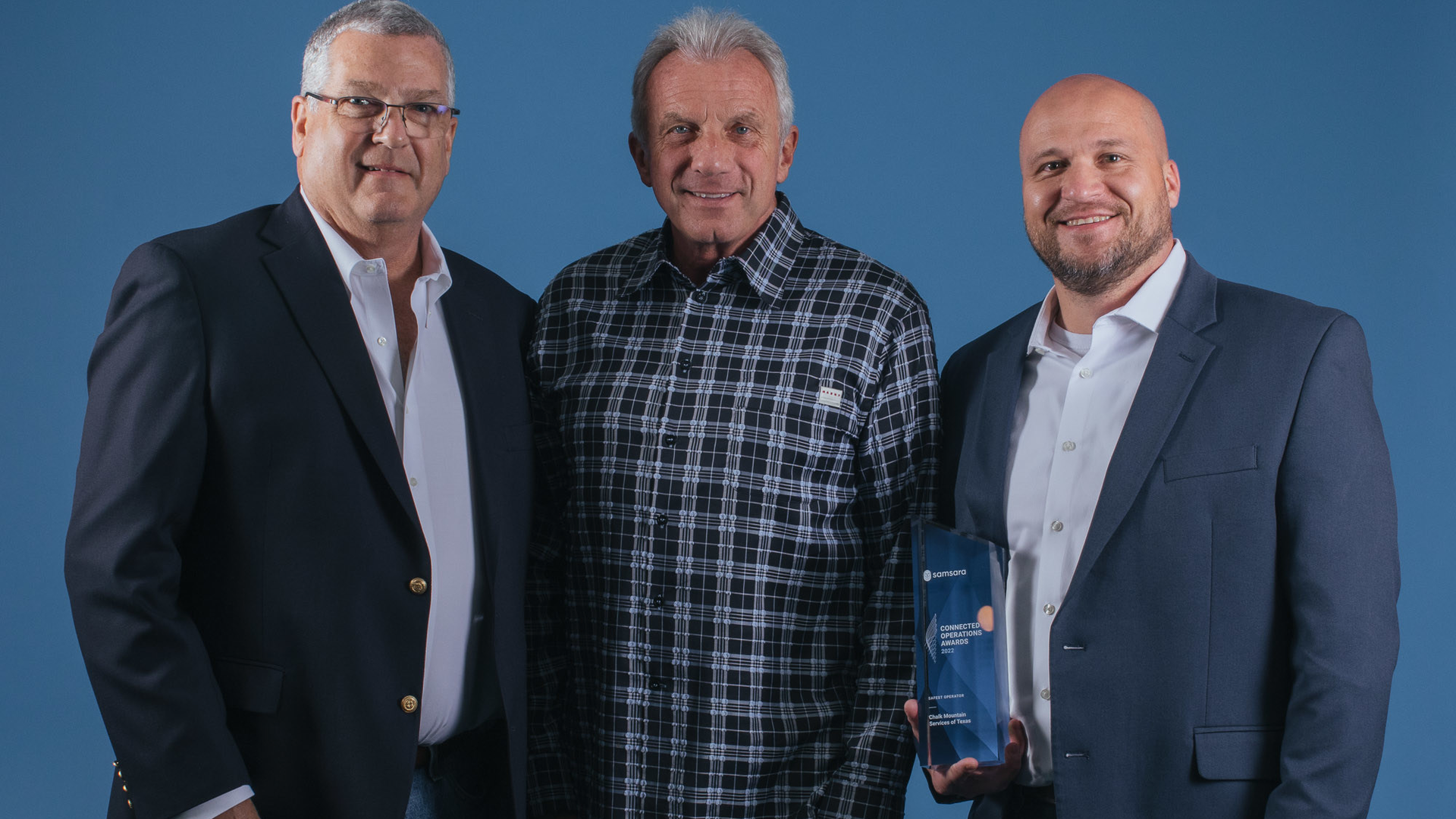 Chalk Mountain Services recently received a safety award from Samsara. From left to right are David Bowe, president of Chalk Mountain, four-time Super Bowl champion Joe Montana, and David Serach, director of safety at Chalk Mountain.