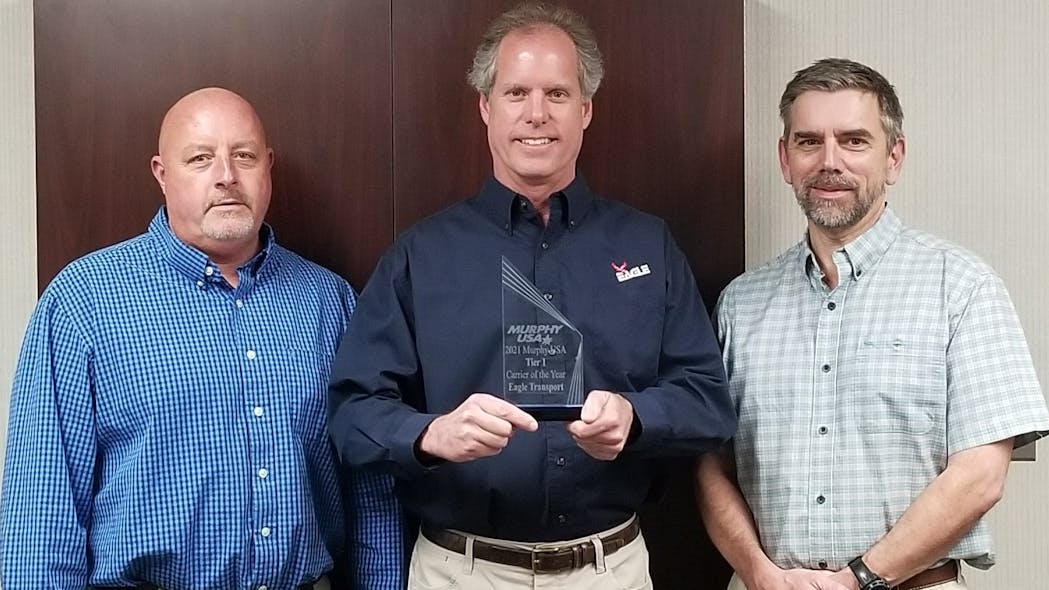 From left to right at Jonathan Greer, Eagle Transport vice president of operations; Herb Evans, vice chairman; and Lance Collette, president and COO.