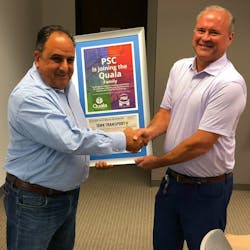 Jerry Cignarella, at left, PSC president and now Quala's president of maintenance, shakes hands with Paul Hofley, vice president of sales and marketing at Quala, during a recent board meeting. Jerry Cignarella, at left, PSC president and now Quala's president of maintenance, shakes hands with Paul Hofley, vice president of sales and marketing at Quala, during a recent board meeting.