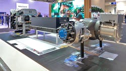 Cummins revealed a new electric drivetrain, including, from left to right, a Power Control and Accessory System (PCAS), lithium iron phosphate (LFP) battery pack, and 17xe ePowertrain, during the IAA Transportation show in Hannover, Germany.