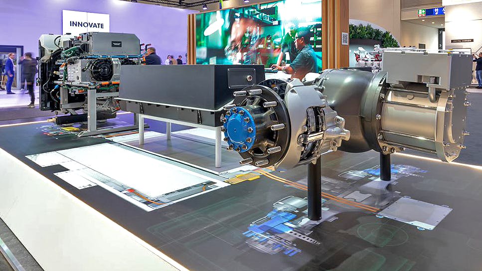 Cummins revealed a new electric drivetrain, including, from left to right, a Power Control and Accessory System (PCAS), lithium iron phosphate (LFP) battery pack, and 17xe ePowertrain, during the IAA Transportation show in Hannover, Germany.