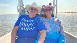 NTTC Professional Driver of the Year finalist Pam Randol, at right, and her father, Anthony Randol, on a recent fishing trip.