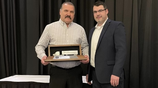 The Trucking Association of New York's safety council named Byrne Dairy the 2022 Statewide Grand Champion. Pictured are Mike Powers, director of fleet safety and transportation for Byrne Dairy, at left, and Joseph Peplinski, TANY safety council chair.