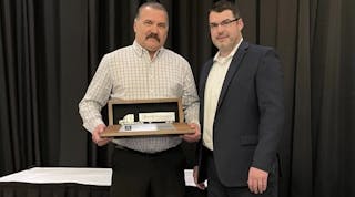 The Trucking Association of New York&apos;s safety council named Byrne Dairy the 2022 Statewide Grand Champion. Pictured are Mike Powers, director of fleet safety and transportation for Byrne Dairy, at left, and Joseph Peplinski, TANY safety council chair.