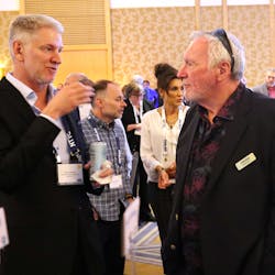 Carbon Express founder Steve Rush, at right, talks to Darron Eschle, Andrews Logistics chairman and CEO, during the 2022 National Tank Truck Carriers Annual Conference in San Diego, Calif.