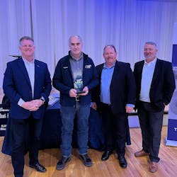Alan Haus won TTE Driver of the Year honors during the company&rsquo;s annual Christmas party. Pictured left to right are J.J. Isbell, TTE president; Haus; Jeff Bolner, operations manager; and James Traylor, vice president of operations.
