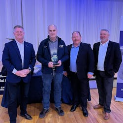 Alan Haus won TTE Driver of the Year honors during the company’s annual Christmas party. Pictured left to right are J.J. Isbell, TTE president; Haus; Jeff Bolner, operations manager; and James Traylor, vice president of operations. Alan Haus won TTE Driver of the Year honors during the company’s annual Christmas party. Pictured left to right are J.J. Isbell, TTE president; Haus; Jeff Bolner, operations manager; and James Traylor, vice president of operations.