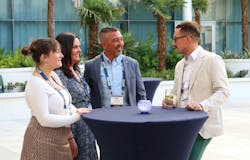 Usher Transport driver Dave Powell enjoys a moment with family and Beau Mosley, Usher chief risk officer, at right, Sunday night during the Act 1 opening night event in Las Vegas. Usher Transport driver Dave Powell enjoys a moment with family and Beau Mosley, Usher chief risk officer, at right, Sunday night during the Act 1 opening night event in Las Vegas.