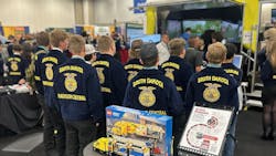 Students line up to test their skills in the simulators in the Next Gen Trucking booth at the 97th Annual National FFA Convention in Indianapolis. Students line up to test their skills in the simulators in the Next Gen Trucking booth at the 97th Annual National FFA Convention in Indianapolis.