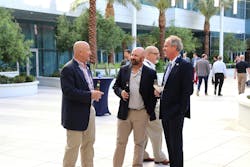 NTTC Chairman Ward Best, at left, visits with Jeremy Mairs, Cox Petroleum president and CEO, at center; and recent past NTTC Chairman Herb Evans, Eagle Transport vice chairman, during NTTC's 2024 Annual Conference. NTTC Chairman Ward Best, at left, visits with Jeremy Mairs, Cox Petroleum president and CEO, at center; and recent past NTTC Chairman Herb Evans, Eagle Transport vice chairman, during NTTC's 2024 Annual Conference.